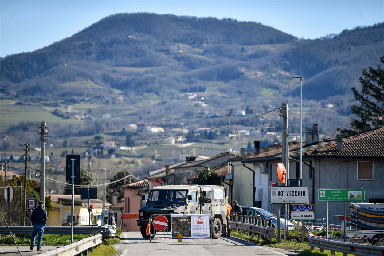 Italian military guarding a roadblock leading to the village of Vo’Euganeo.Credit...